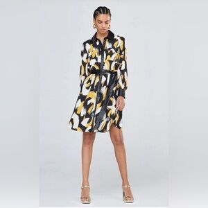 Stunning dress with PU leathered cuffs and PU leather collar, missing the belt